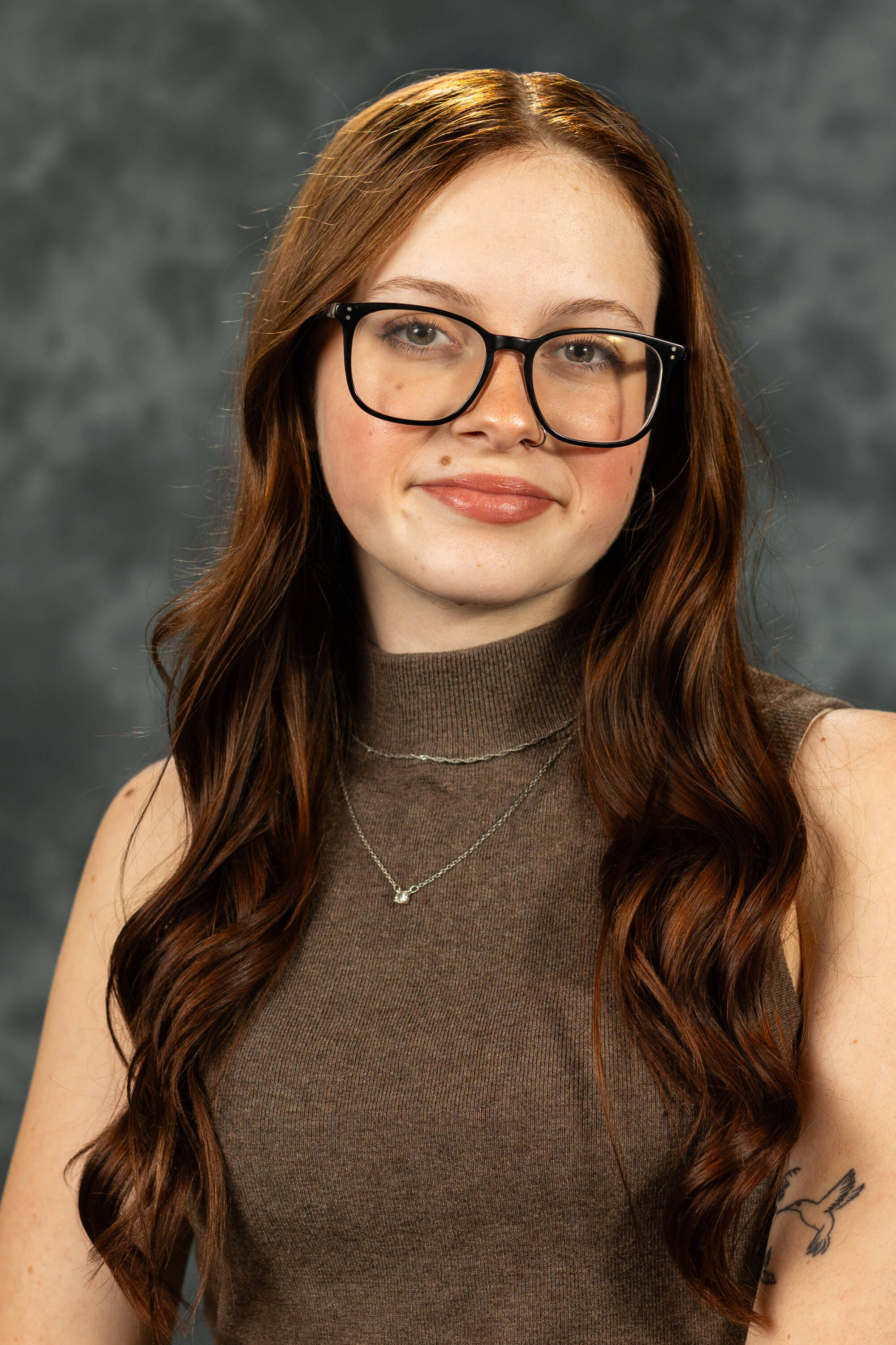 Karen Theakston in brown top.